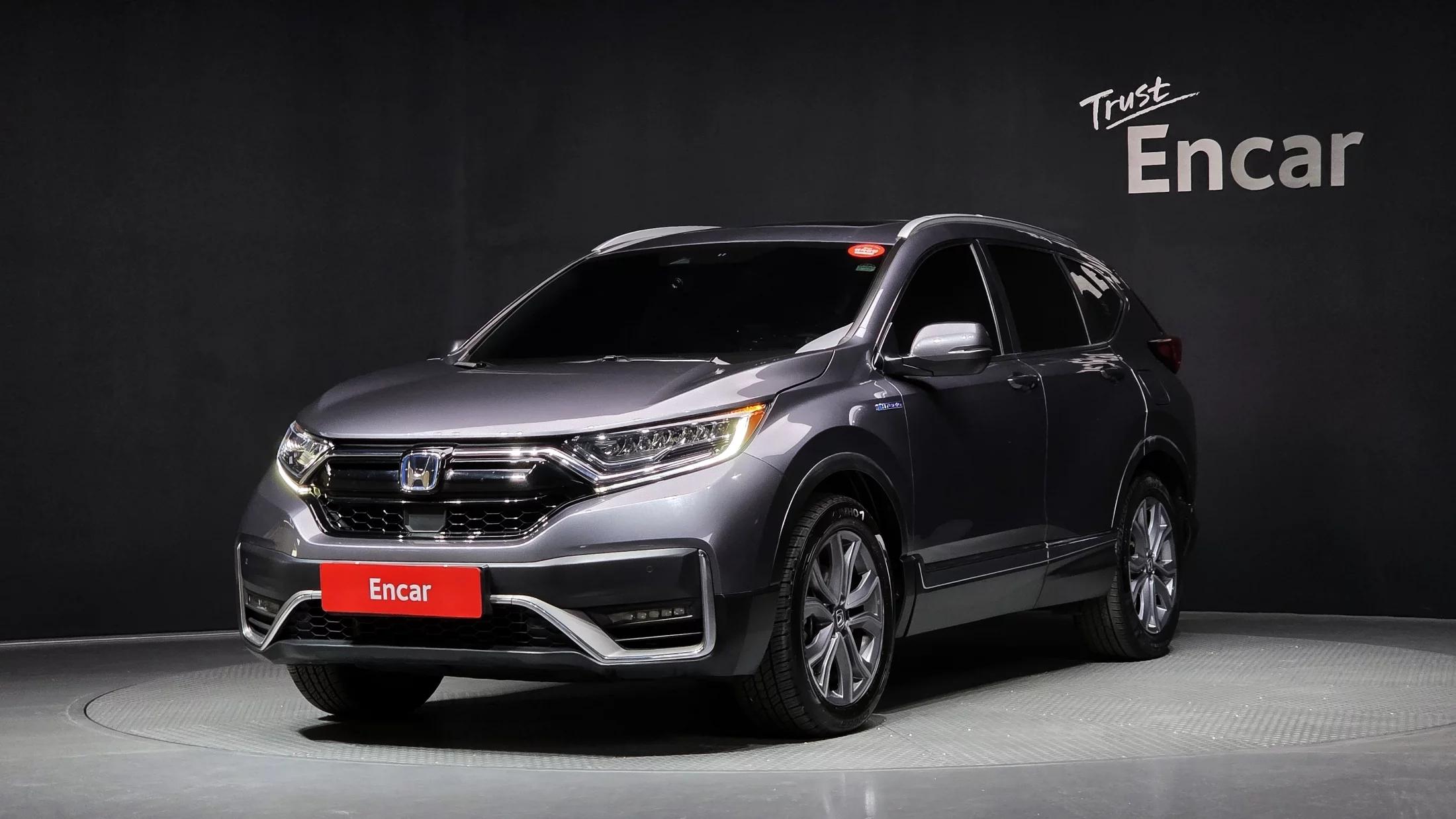 Honda CR-V 2.0 Hybrid Touring 4WD, гибрид, 2022 г. 67438 км.